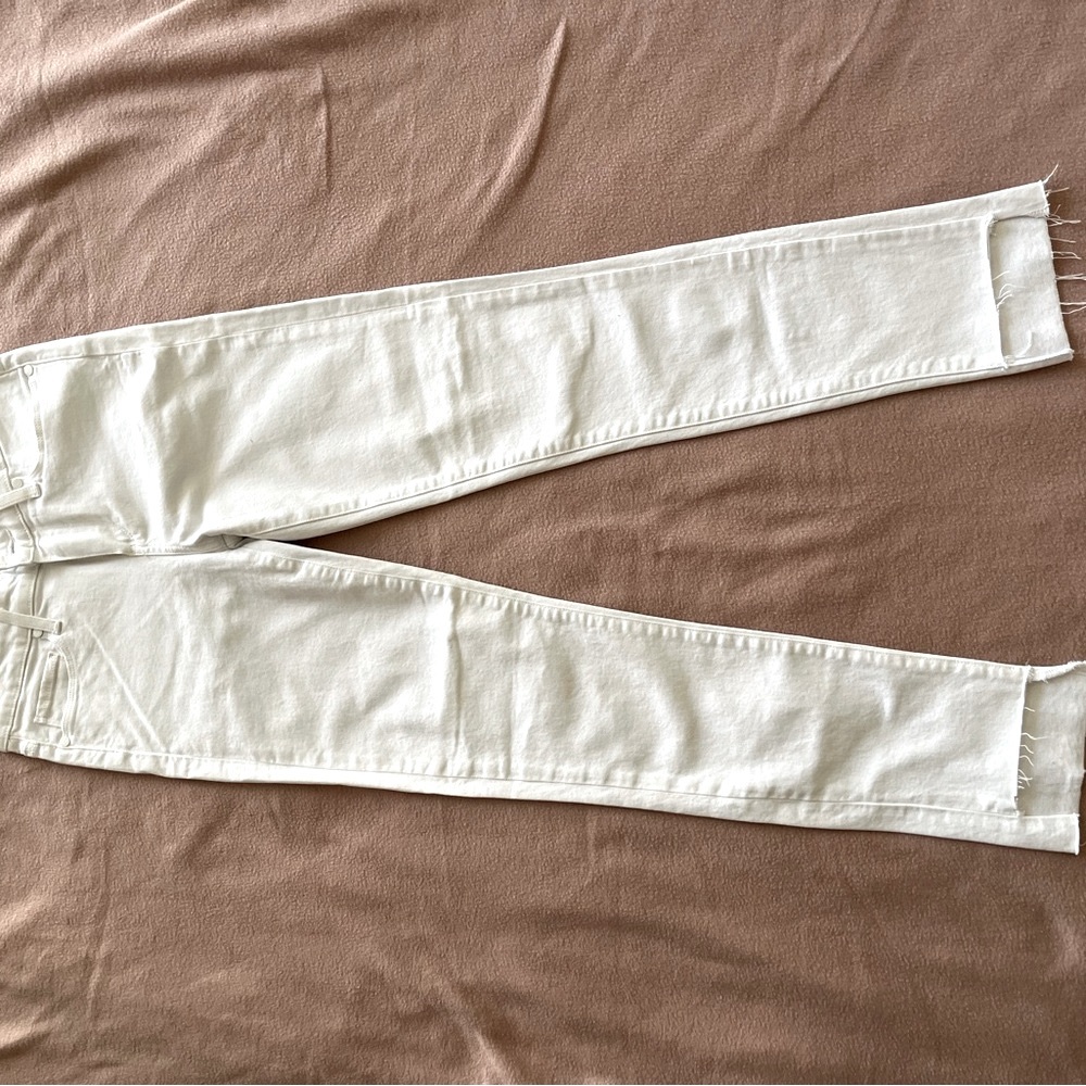 NWOT size 27 white PAIGE jeans. Slim fit with cut hem style